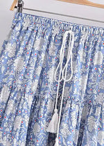 Boho mini wrap skirt, sky blue floral pattern with pompom
