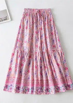 Pink boho ruffled maxi skirt with floral pattern