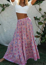 Pink boho ruffled maxi skirt with floral pattern