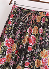 Boho black maxi skirt with floral pink pattern