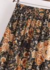 Black Boho maxi Skirt with orange floral pattern