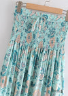 Blue Boho long Skirt with smocked waist, floral pattern with slit