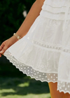 Boho White  skirt, short and fluid, with embroidered patterns
