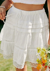 Boho White  skirt, short and fluid, with embroidered patterns